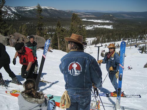 Brokeback Ski Area patrollers assisting injured skier